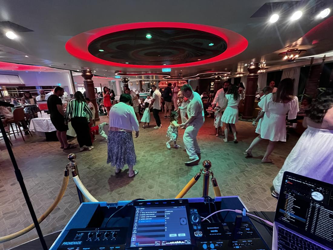 Grandparents, parents and toddlers sharing a dance floor