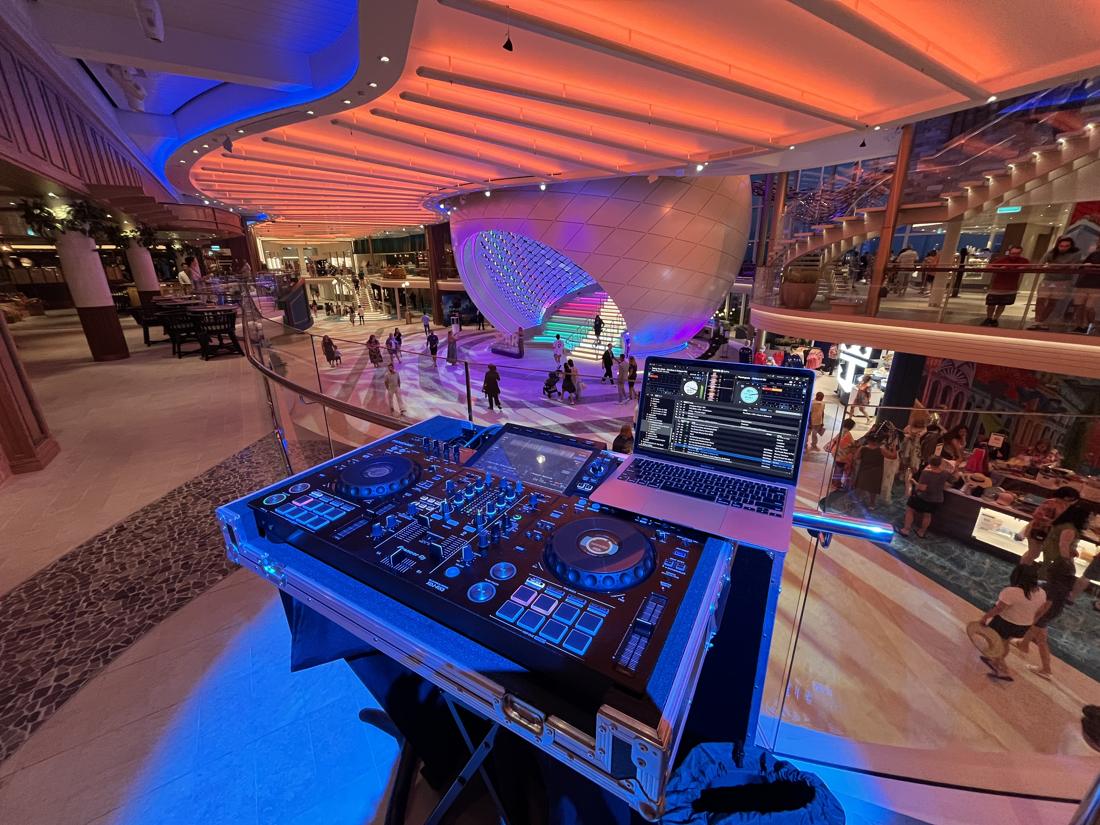 Clean DJ setup in a case with laptop stand